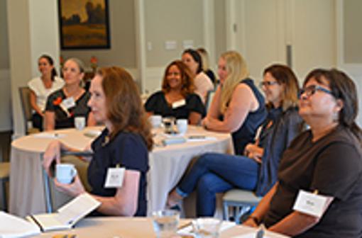 Attendees participate in the Women’s Resilience Forum kick-off event